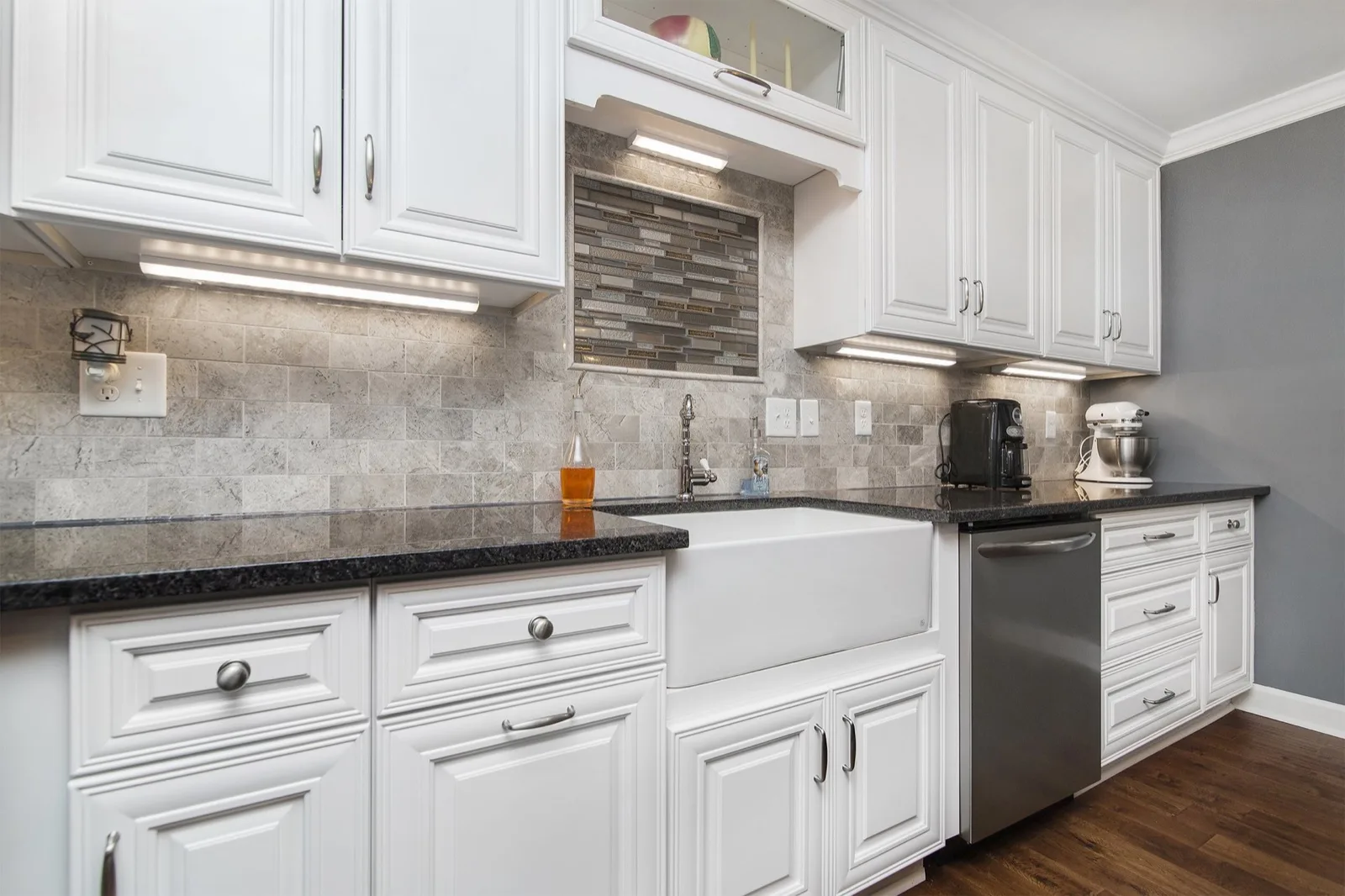 White shaker kitchen with custom cabinetry built and installed by Piloni Home Design
