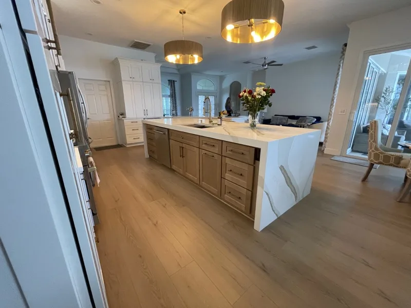 Custom wood kitchen island with cabinetry built and installed by Piloni Home Design